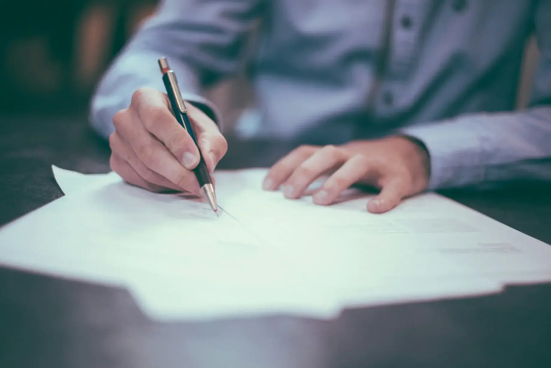 Business owner reviewing LLC formation documents — how to form an LLC in Nevada